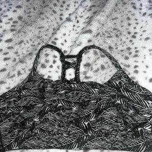 Sports Top - never been worn lighting is hard to tell but it is a Olive green.